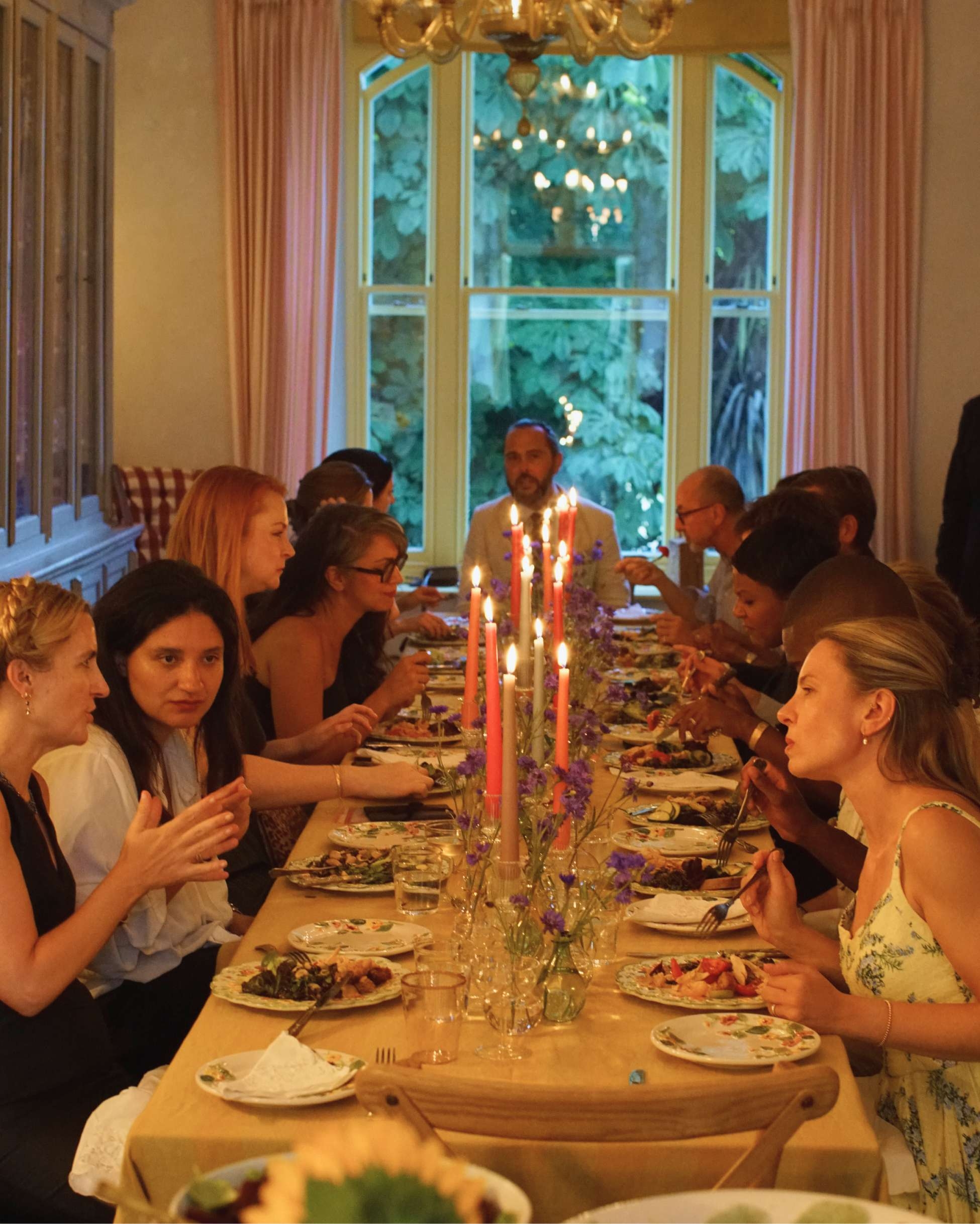 Guests sat at dinner table