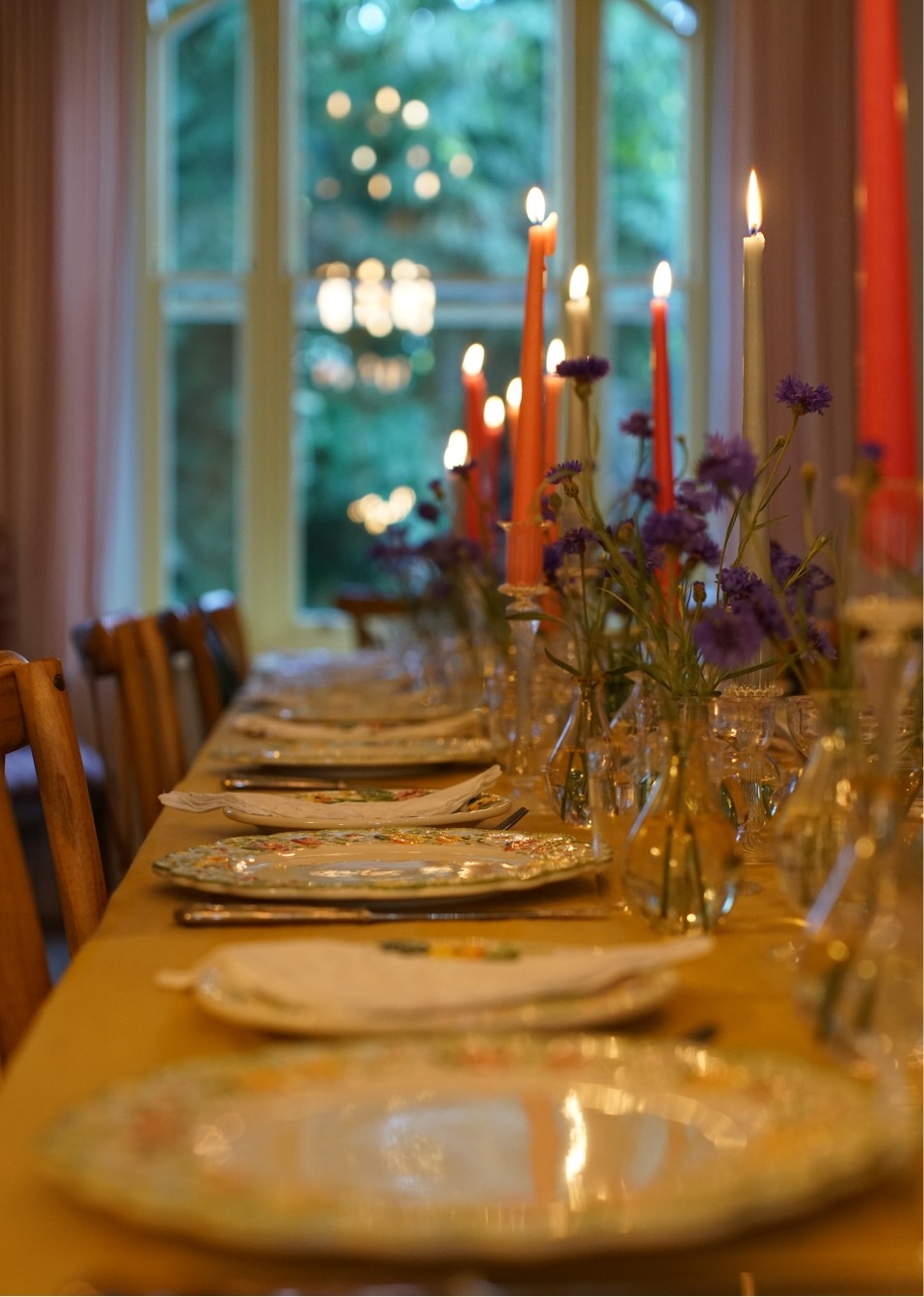 Tablet set up for dinner with candles lit