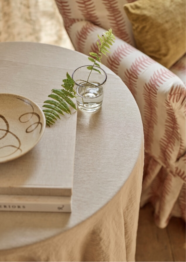 Skirted Snape in Frond Stripe Small Berry next to table